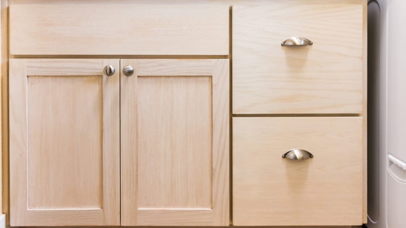When the space is tight, laundry room cabinets become an essential element of the room